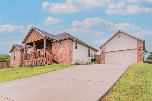 ranch-style house featuring brick siding, a front lawn, driveway, and a porch