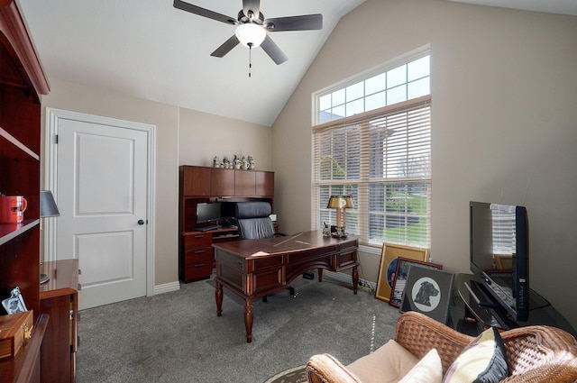 office area with ceiling fan, lofted ceiling, carpet flooring, and baseboards