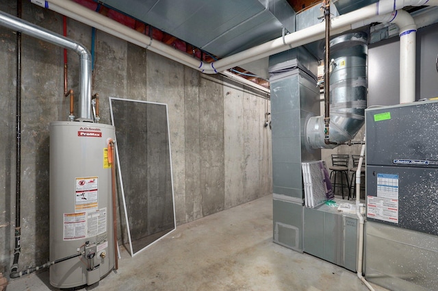 utility room featuring gas water heater
