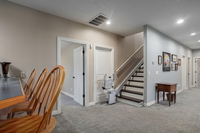 stairs with carpet flooring, baseboards, and recessed lighting