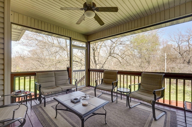 deck with ceiling fan and an outdoor hangout area