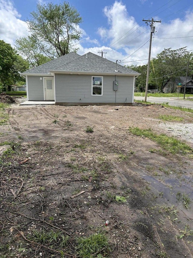 1101 S Sergeant Ave, Joplin, MO 64801 - rear view of property featuring roof with shingles