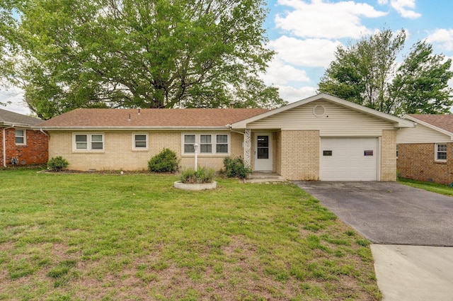 ranch-style house with an attached garage, brick siding, asphalt driveway, and a front lawn