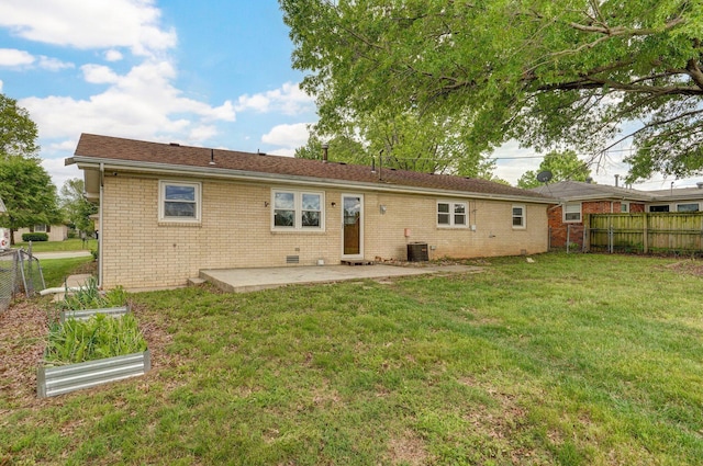 back of property featuring a patio area, central AC unit, and brick siding