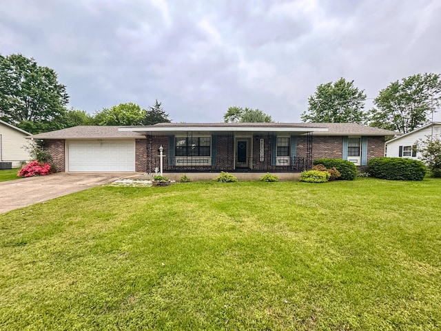 single story home with brick siding, an attached garage, a front lawn, concrete driveway, and covered porch