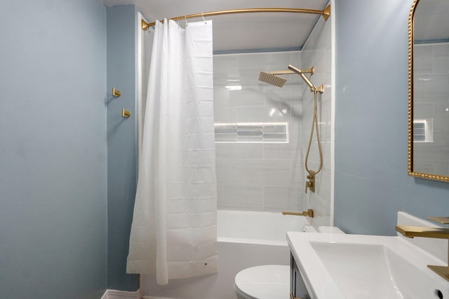 bathroom featuring toilet, shower / bath combo, and vanity