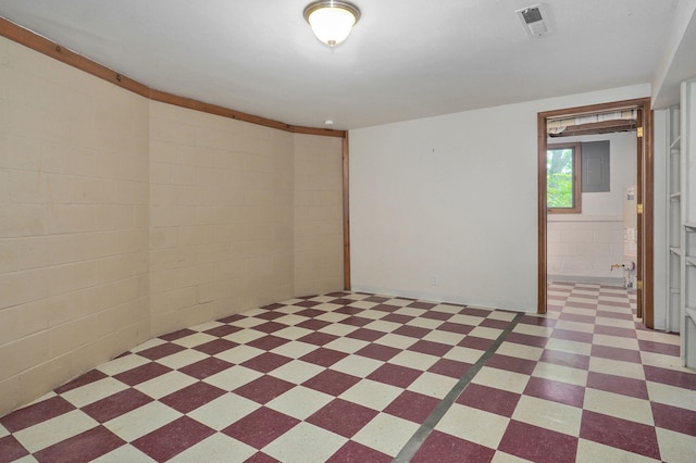 basement featuring light floors