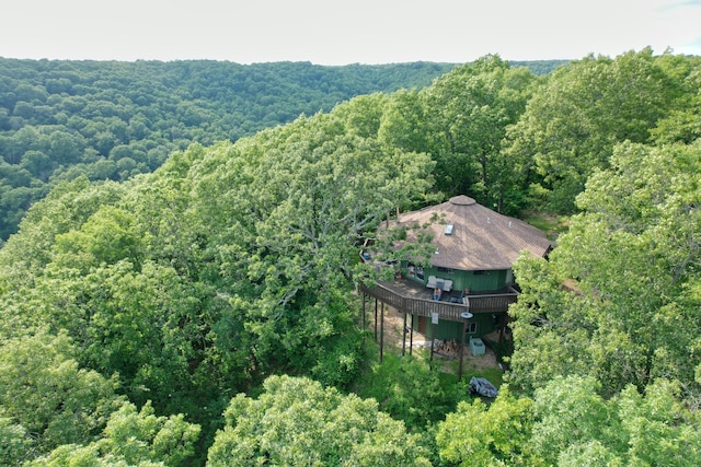 view from above of property with a forest