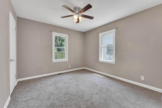 1606 N Waverly Ave, Springfield, MO 65803 - carpeted spare room featuring a ceiling fan and baseboards