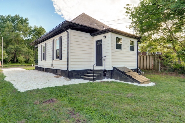 back of property featuring entry steps