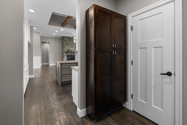 5918 S Mccann Ave, Springfield, MO 65804 - hall with dark wood-style flooring, recessed lighting, baseboards, and ornamental molding
