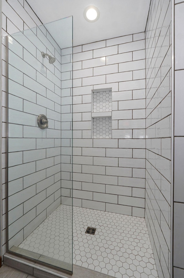 full bathroom with a shower stall