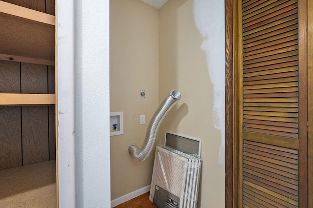 laundry view of baseboards