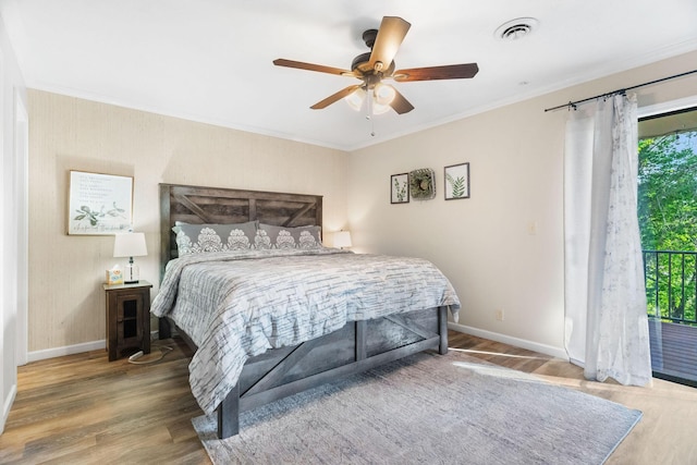 112 Overlook Dr Unit 5, Branson, MO 65616 - bedroom with wood finished floors, baseboards, and ornamental molding