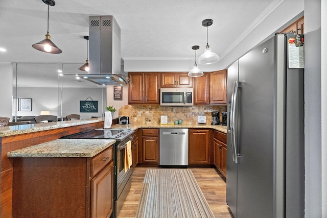 112 Overlook Dr Unit 5, Branson, MO 65616 - kitchen featuring stainless steel appliances, island range hood, brown cabinets, light stone counters, and crown molding