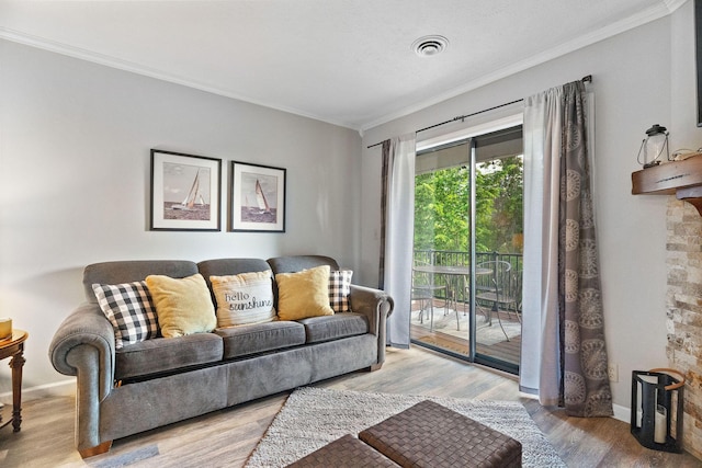 112 Overlook Dr Unit 5, Branson, MO 65616 - living area with wood finished floors, ornamental molding, and baseboards
