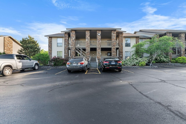 112 Overlook Dr Unit 5, Branson, MO 65616 - view of building exterior with uncovered parking