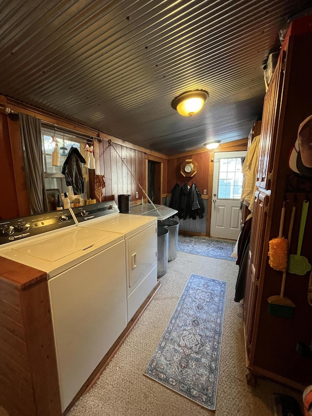 111 W Olive St, El Dorado Springs, MO 64744 - laundry room featuring washer and dryer and light colored carpet