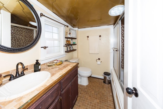 111 W Olive St, El Dorado Springs, MO 64744 - full bathroom featuring a shower with door, vanity, and toilet