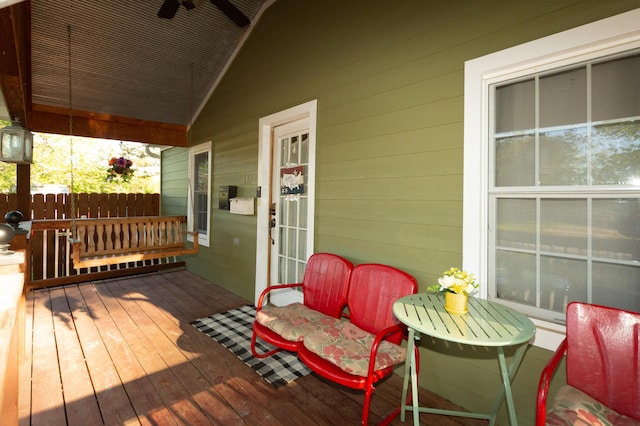 111 W Olive St, El Dorado Springs, MO 64744 - wooden terrace featuring a porch and french doors
