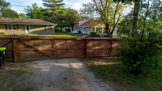 111 W Olive St, El Dorado Springs, MO 64744 - gate featuring fence