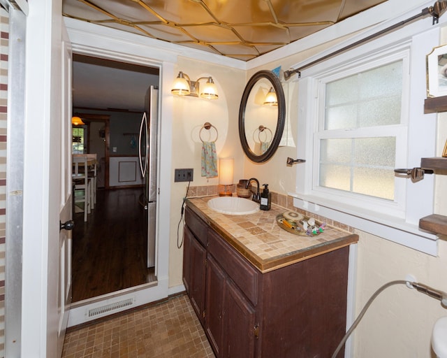 111 W Olive St, El Dorado Springs, MO 64744 - bathroom with vanity