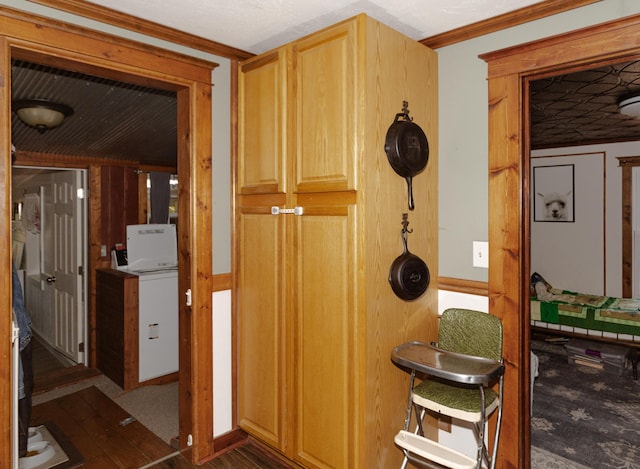111 W Olive St, El Dorado Springs, MO 64744 - hall featuring crown molding and dark wood-type flooring