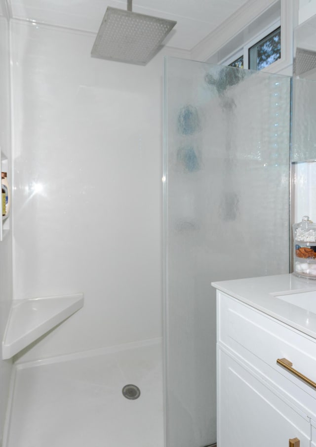 111 W Olive St, El Dorado Springs, MO 64744 - bathroom featuring a shower stall and vanity