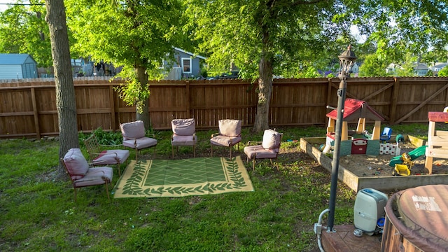 111 W Olive St, El Dorado Springs, MO 64744 - view of yard featuring a patio area
