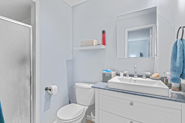 full bath with a shower stall, toilet, and vanity