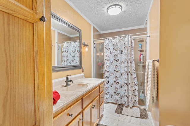 bathroom featuring a textured ceiling, a stall shower, ornamental molding, vanity, and tile patterned flooring