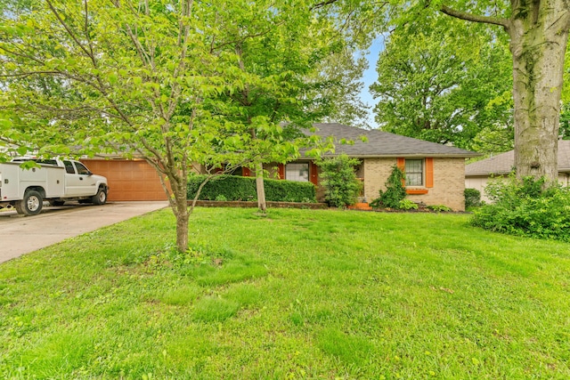 view of front facade with a garage, a front lawn, driveway, brick siding, and a shingled roof