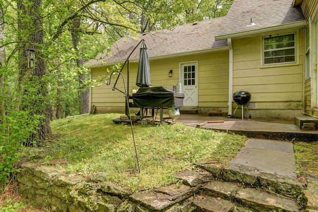 4855 E Cimarron Ln, Springfield, MO 65803 - rear view of house featuring a shingled roof