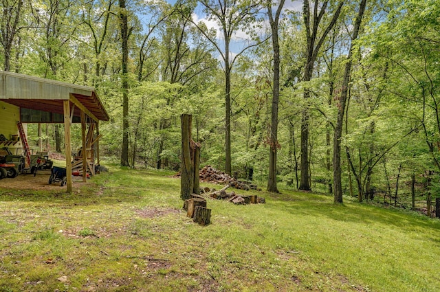 4855 E Cimarron Ln, Springfield, MO 65803 - view of grassy yard featuring a wooded view