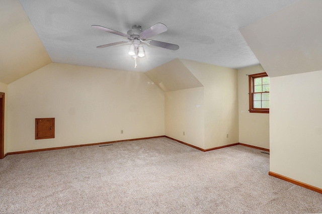 4855 E Cimarron Ln, Springfield, MO 65803 - bonus room featuring carpet flooring, vaulted ceiling, ceiling fan, and baseboards