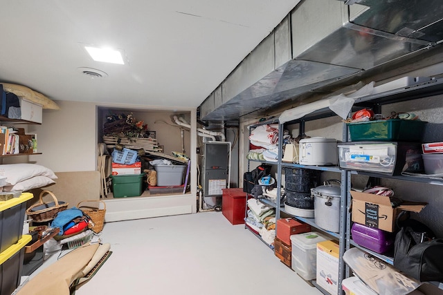 storage room featuring heating unit