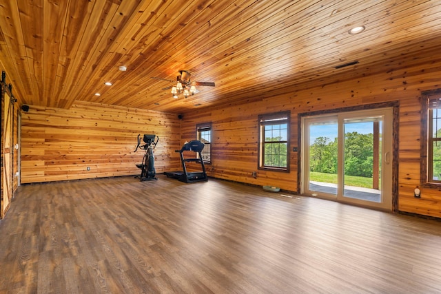 2885 Possum Trot Rd, Billings, MO 65610 - workout room with wood ceiling, wood walls, wood finished floors, and recessed lighting