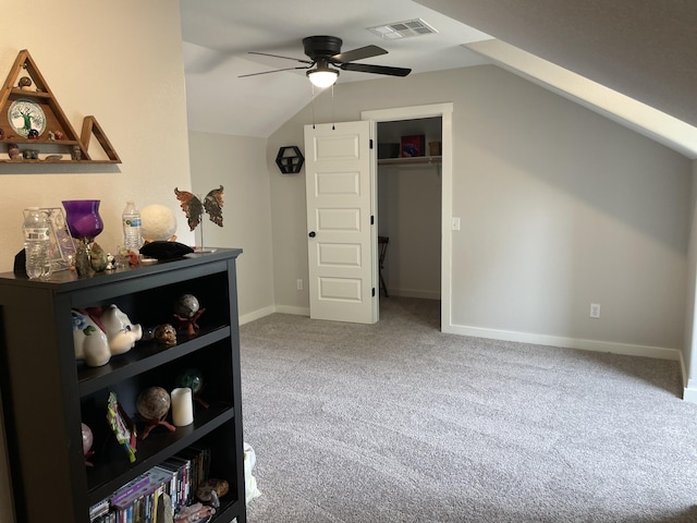 additional living space with carpet, a ceiling fan, vaulted ceiling, and baseboards
