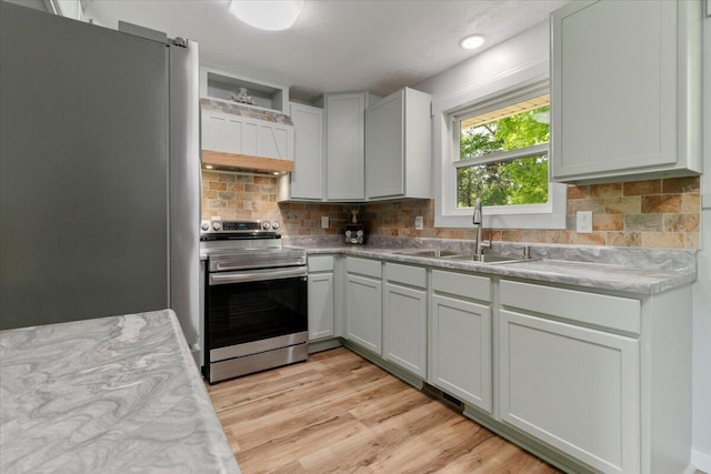 79 County Road 101, Gainesville, MO 65655 - kitchen featuring stainless steel appliances, a sink, tasteful backsplash, light countertops, and recessed lighting