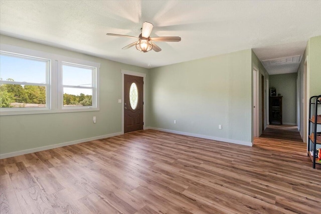 79 County Road 101, Gainesville, MO 65655 - entryway with ceiling fan, wood finished floors, and baseboards