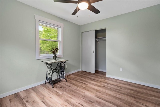 79 County Road 101, Gainesville, MO 65655 - unfurnished bedroom with wood finished floors, baseboards, a closet, and ceiling fan