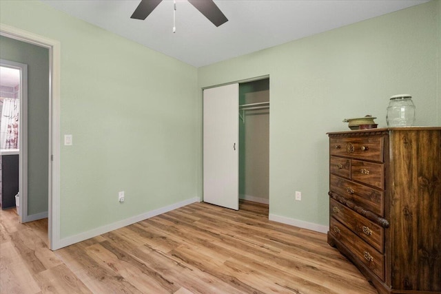 79 County Road 101, Gainesville, MO 65655 - bedroom with light wood finished floors, baseboards, a closet, and ceiling fan