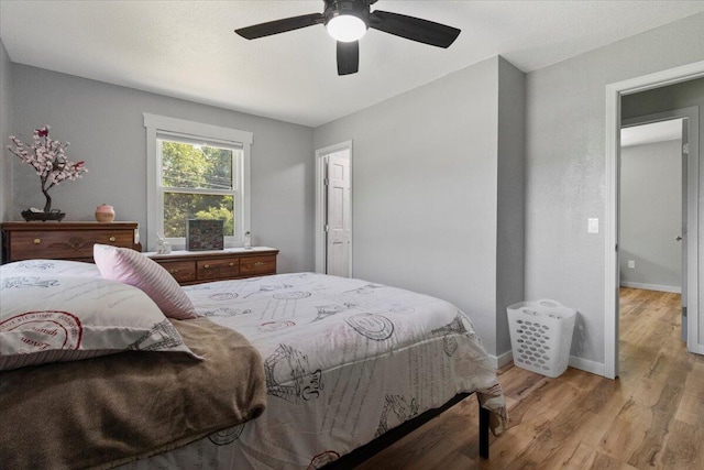 79 County Road 101, Gainesville, MO 65655 - bedroom featuring light wood-type flooring, baseboards, and ceiling fan