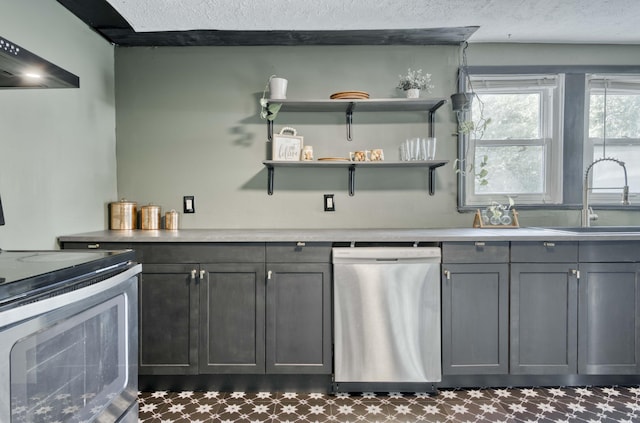 bar with stove, dishwasher, a sink, ventilation hood, and tile patterned floors
