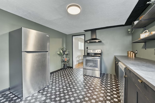 kitchen featuring stainless steel appliances, wall chimney exhaust hood, tile patterned floors, open shelves, and a textured ceiling