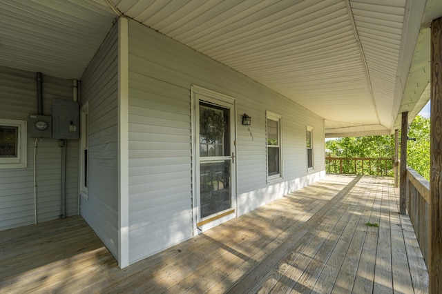 deck with covered porch and electric panel