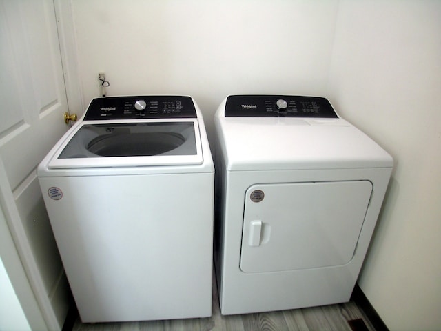 laundry room with washer and clothes dryer