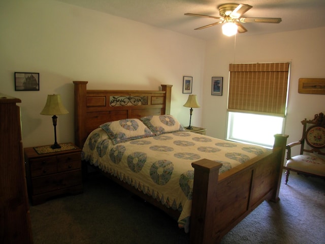 carpeted bedroom with a ceiling fan