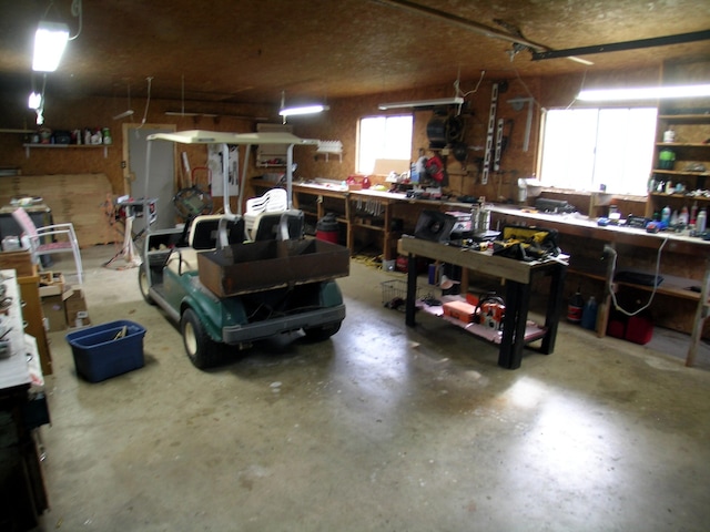 garage with a workshop area