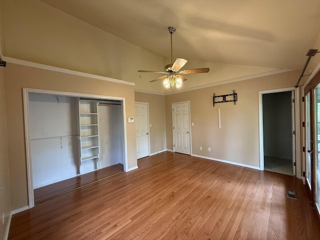 16709 Honeysuckle Hill Rd, Eminence, MO 65466 - unfurnished bedroom featuring lofted ceiling, wood finished floors, baseboards, ceiling fan, and a closet